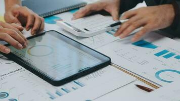 Close up of Business team analyzing income charts and graphs with modern laptop computer. Business analysis and strategy concept. video