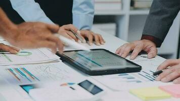 Close up of Business team analyzing income charts and graphs with modern laptop computer. Business analysis and strategy concept. video