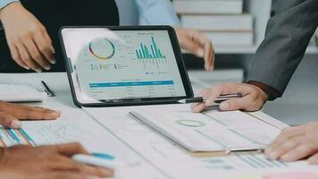 Close up of Business team analyzing income charts and graphs with modern laptop computer. Business analysis and strategy concept. video
