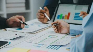 Close up of Business team analyzing income charts and graphs with modern laptop computer. Business analysis and strategy concept. video