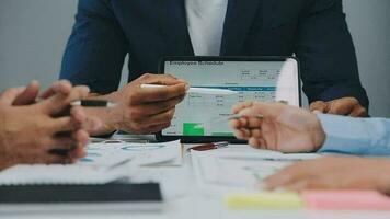 Close up of Business team analyzing income charts and graphs with modern laptop computer. Business analysis and strategy concept. video