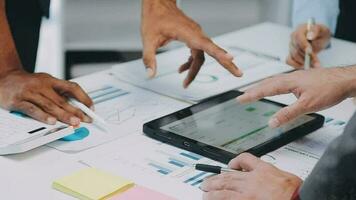 Close up of Business team analyzing income charts and graphs with modern laptop computer. Business analysis and strategy concept. video