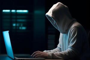 Mysterious hacker wearing a hoodie is typing on a laptop, generative ai photo