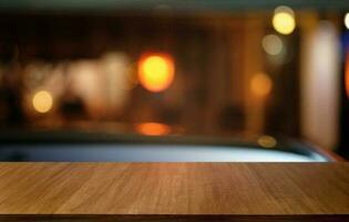 Empty dark wooden table in front of abstract blurred bokeh background of restaurant . can be used for display or montage your products.Mock up for space. photo