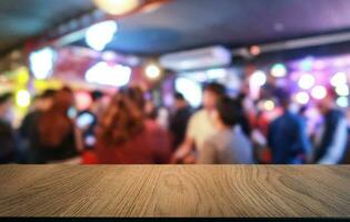 Wood Table Top in Blur Background room interior with empty copy space. photo