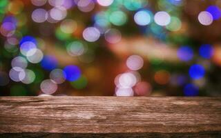 Empty wooden table in front of abstract bokeh background . can be used for display or montage your products.Mock up for display of product. for Christmas, new year celebration. photo