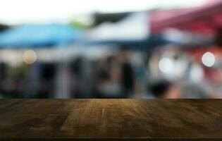 Empty dark wooden table in front of abstract blurred bokeh background of restaurant . can be used for display or montage your products.Mock up for space. photo