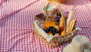 Picnic Lunch Meal Outdoors Park with food picnic basket. enjoying picnic time in park nature outdoor photo