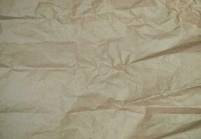 Brown wrapping paper texture, crumpled clean sheet. Craft crumpled paper, cardboard background. Wallpaper or parchment abstract design, Horizontal rough carton, old material photo