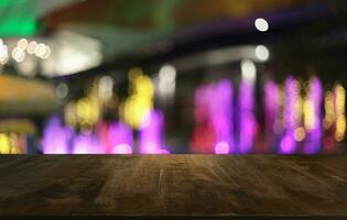 Wood Table Top in Blur Background room interior with empty copy space. photo