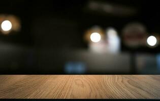 Wood Table Top in Blur Background room interior with empty copy space. photo