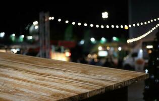 Wood Table Top in Blur Background room interior with empty copy space. photo