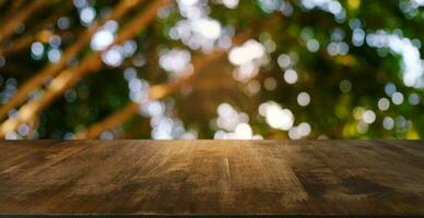 Empty wooden table in front of abstract blurred background of coffee shop . can be used for display or montage your products.Mock up for display photo