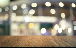 Wood Table Top in Blur Background room interior with empty copy space. photo