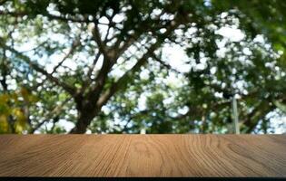 Wood Table Top in Blur Background room interior with empty copy space. photo