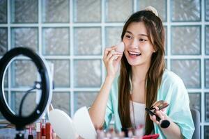 Young Asian girl makeup artist photo