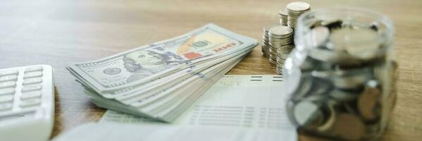 Close up of money stack coins and Dollar banknotes Saving money financial banking concept photo