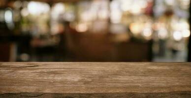 Empty wooden table in front of abstract blurred background of coffee shop . can be used for display or montage your products.Mock up for display photo