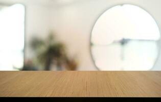 Empty dark wooden table in front of abstract blurred bokeh background of restaurant . can be used for display or montage your products.Mock up for space. photo