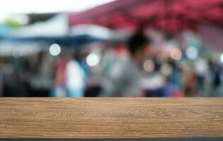 Wood Table Top in Blur Background room interior with empty copy space. photo