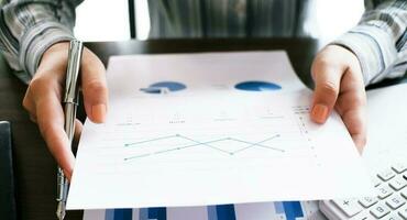 Financial inspector making report  calculating or checking balance. Business Audit concept photo