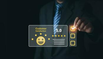 User gives rating to service experience on online application, Customer review satisfaction feedback survey concept, Customer can evaluate quality of service leading to reputation ranking of business. photo