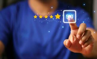 Customer Experience Concept man hand showing on five star excellent rating on background photo