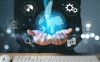businessman Hand holding virtual Global Internet connection metaverse. Business global internet connection application technology and digital marketing, Financial and banking, big data. photo