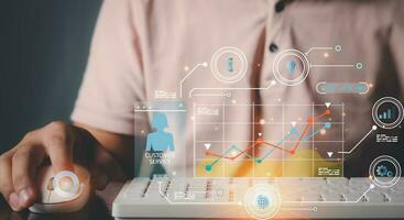 startup business finance technology .businessman hand type on laptop for work of company profit with colleagues partner explain with virtual dashboard statistic chart stock infographic. photo