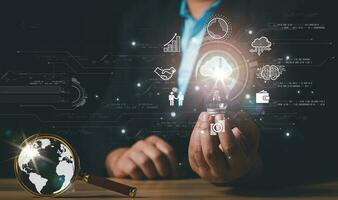 Digital marketing. Hand holding light bulb with global internet connection, Application technology and digital marketing innovation technology, Financial and banking, Digital link tech, big data. photo