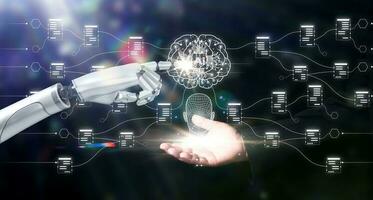 Machine learning, Hands of robot and human touching a Ai brain, Science and artificial intelligence technology, innovation and futuristic. Robotic holding a mechanical artificial intelligence brain. photo