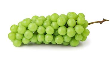 Sweet Green Grape with leaves isolated on white, Shine Muscat Grape isolated on white background With clipping path. photo