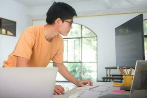 Programmers and developer teams are coding and developing software photo