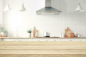 Empty Wood table top on blurred kitchen background. photo