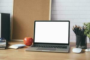 Mock up blank white screen laptop. photo