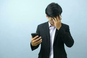 Portrait of businessman talking on phone. photo