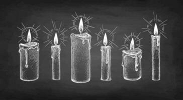 Candles burning. Chalk sketch on blackboard background. Hand drawn vector illustration. Retro style.