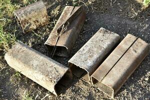 Scrap metal. Various rusty pipes and rods. photo