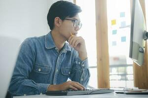 Programmers and developer teams are coding and developing software photo