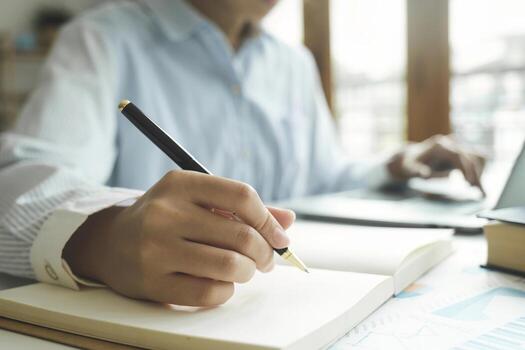 Close up female hands using computer laptop for online working. photo