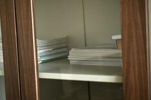 Office furniture. A brown box for documents. The handles are at the old drawer. photo