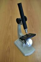 A school laboratory microscope. Laboratory with a microscope. photo