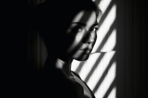 A Woman in light and shadow in black and white created with generative AI technology. photo