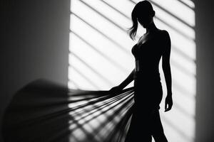 A Woman in light and shadow in black and white created with technology. photo