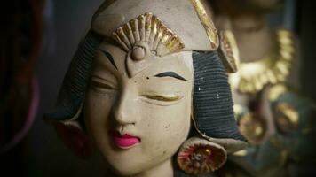 Beautiful artistic statue of a Balinese or javanese dancer used as garden decoration, javanese gnome indonesia photo