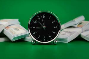 Dollar, savings and clock in a glass jar. Investment. Financial stock. Financial income. Salary. Financial investment. financial system money and time saving concept photo