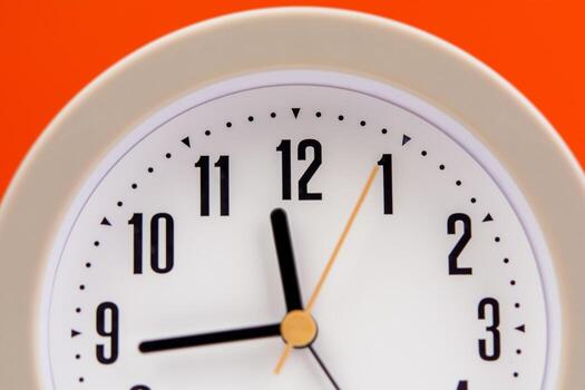 alarm clock time strategy Work plan with time. Orange background. Working with time. Punctuality. Keep time. Value time concept. photo