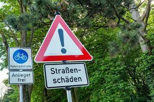 traffic sign with trees in the background photo