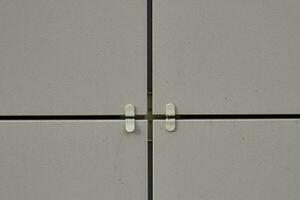 white wall tile beacons. construction and repair. photo