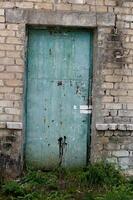 Abstract background of old blue metal doors photo